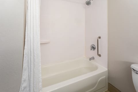 Standard Room, 2 Queen Beds | Bathroom | Combined shower/tub, free toiletries, hair dryer, towels