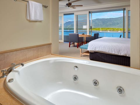 Junior Suite, 1 King Bed | Bathroom | Separate tub and shower, jetted tub, designer toiletries, hair dryer