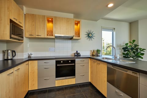 Top Floor Ocean/Mountain View Apartment | Private kitchen | Full-size fridge, microwave, oven, stovetop