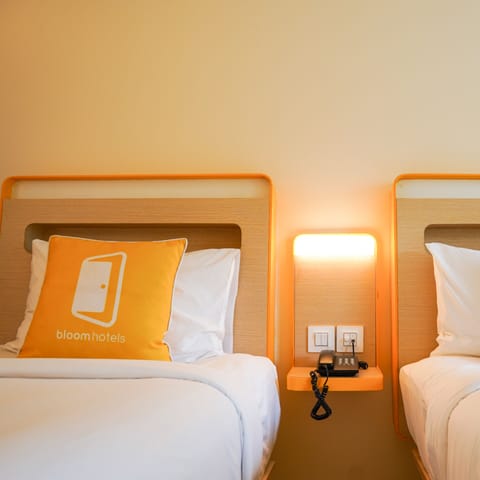 Standard Twin Room | Minibar, in-room safe, iron/ironing board, rollaway beds