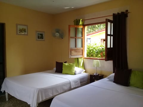 Deluxe Twin Room | Minibar, blackout drapes, iron/ironing board, free WiFi