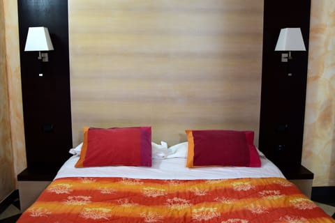 Economy Double Room | 1 bedroom, premium bedding, in-room safe, desk