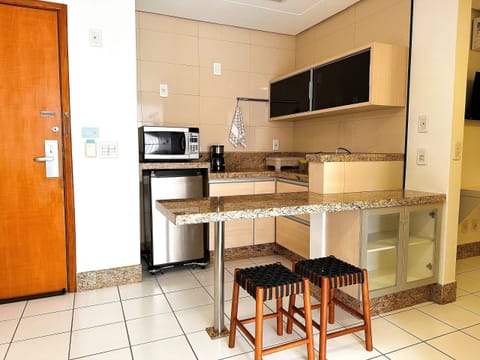 Comfort Apartment | Private kitchen | Mini-fridge, highchair, cookware/dishes/utensils