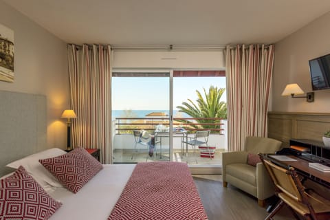 Privilege Room, partial Ocean View | In-room safe, desk, free WiFi, bed sheets