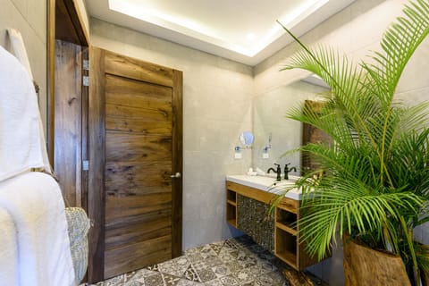 Presidential Suite | Bathroom | Shower, rainfall showerhead, hair dryer, bathrobes