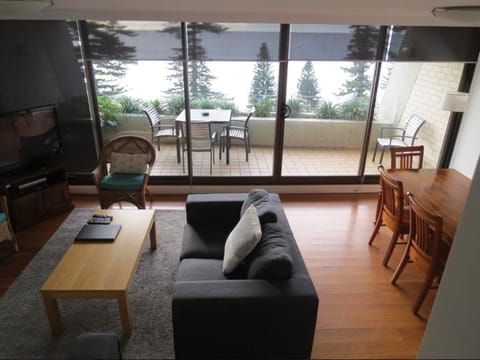 Standard Apartment, 2 Bedrooms, Ocean View | Living area | 32-inch TV with digital channels