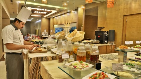 2 restaurants, breakfast, lunch, dinner served; Indian cuisine