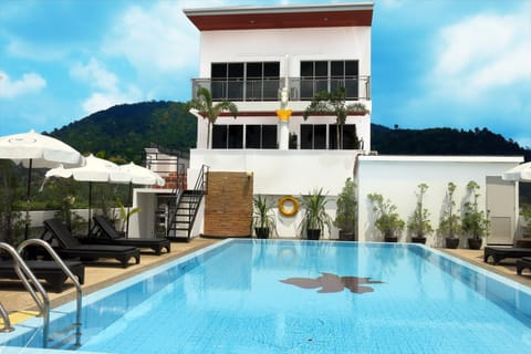 Outdoor pool, open 8:00 AM to 7:00 PM, pool umbrellas, sun loungers