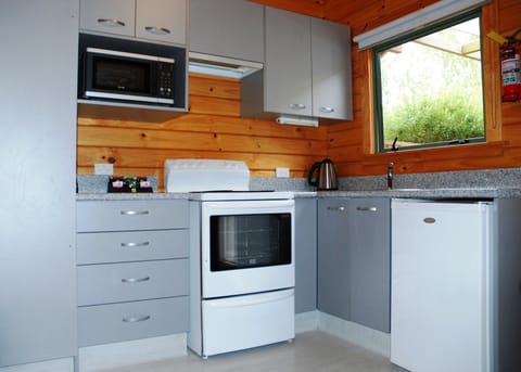 Two Bedroom Chalet (Sleeps 6) | Private kitchen | Mini-fridge, microwave, oven, stovetop