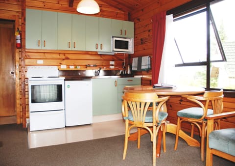 Two Bedroom Chalet (Sleeps 4) | Private kitchen | Mini-fridge, microwave, oven, stovetop