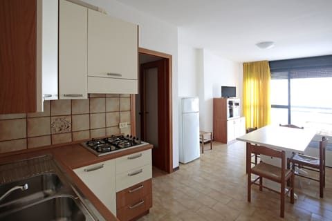 Standard Apartment, 2 Bedrooms | Private kitchenette | Full-size fridge, stovetop, cookware/dishes/utensils