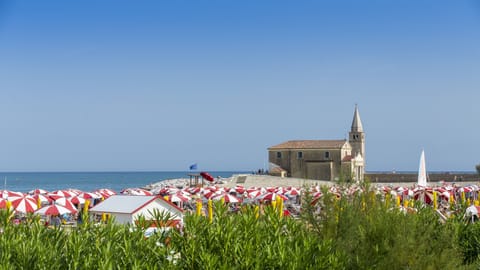 Beach nearby, sun loungers, beach umbrellas, beach bar