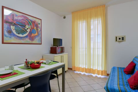 Apartment, 1 Bedroom | Living area | 22-inch TV with satellite channels