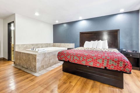 Suite, 1 King Bed, Non Smoking | In-room safe, desk, blackout drapes, rollaway beds