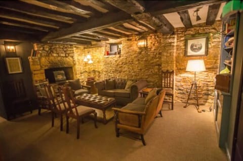 Suite, 1 King Bed, Bathtub | Living area | Flat-screen TV