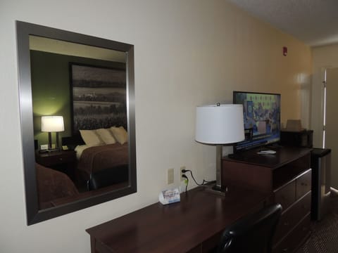 Standard Room, 1 King Bed | Living area | TV