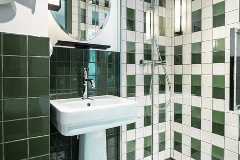 Medium Double Superior Floor | Bathroom | Shower, hair dryer, towels