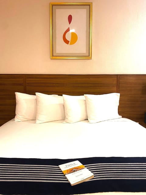 Junior Room | Premium bedding, down comforters, Select Comfort beds, free WiFi