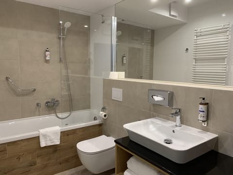 Superior Twin Room | Bathroom | Designer toiletries, hair dryer, bathrobes, slippers