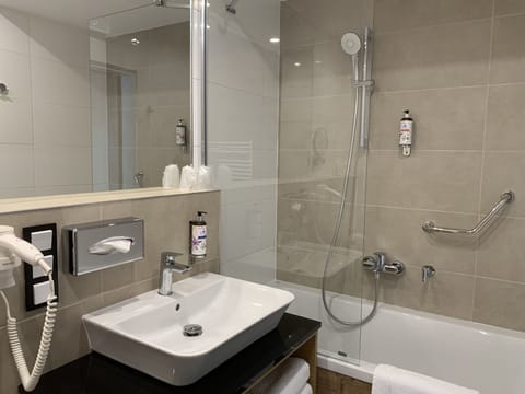 Standard Double Room | Bathroom | Designer toiletries, hair dryer, bathrobes, slippers