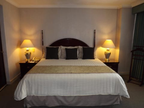 Desk, blackout drapes, free cribs/infant beds, rollaway beds