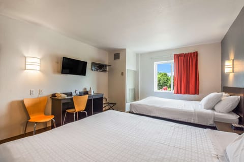 Room, 2 Queen Beds, Non Smoking | Blackout drapes, iron/ironing board, free WiFi, bed sheets