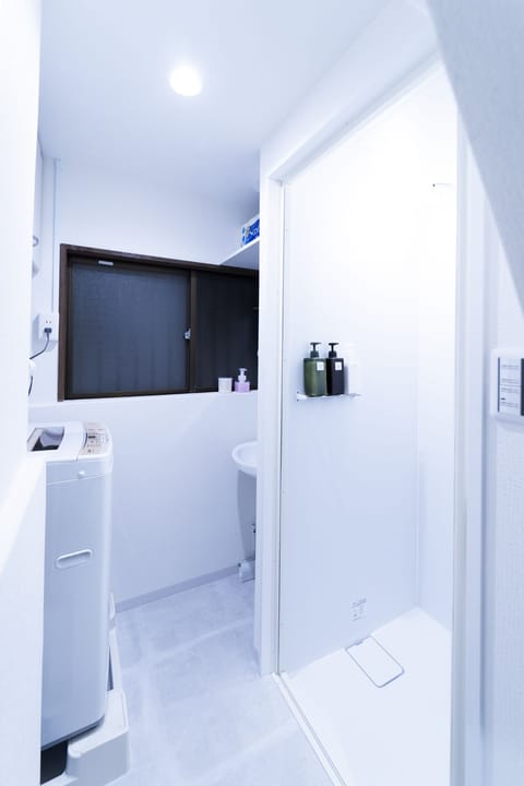 Private Vacation Home | Bathroom | Shower, free toiletries, hair dryer, slippers