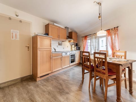 Apartment | Private kitchen | Fridge, coffee/tea maker, highchair
