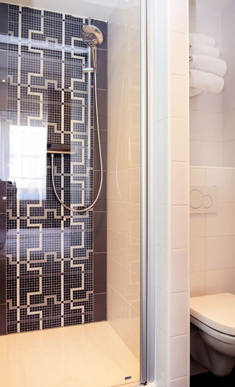 Eco-friendly toiletries, hair dryer, towels