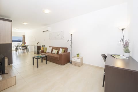 Apartment, 2 Bedrooms (1) | Living area | 40-inch LED TV with satellite channels, TV