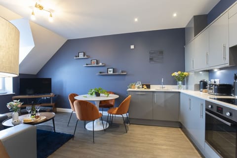 Apartment, 2 Bedrooms | Living area | 32-inch flat-screen TV with digital channels, TV, Netflix