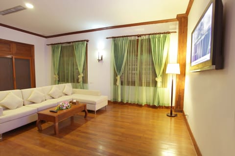 Private Villa 2-Bedroom with Half Board | Living room | Plasma TV, fireplace