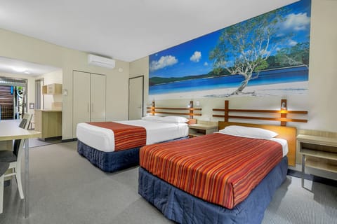 Wallum Resort Hotel Room | Iron/ironing board, cribs/infant beds, bed sheets