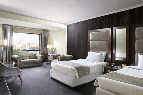 Executive Room, 2 Twin Beds | Minibar, in-room safe, iron/ironing board, WiFi