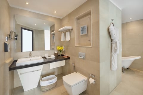 Suite, 1 King Bed (Executive Suite) | Bathroom | Shower, rainfall showerhead, free toiletries, hair dryer