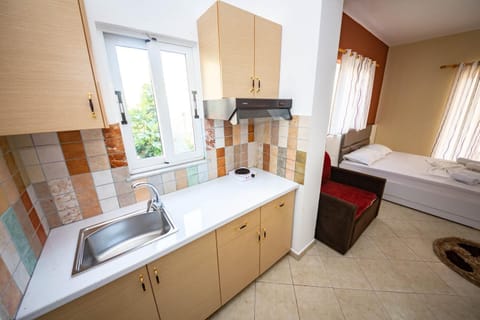 Double Room, Sea View | Private kitchen | Fridge, oven, stovetop, coffee/tea maker