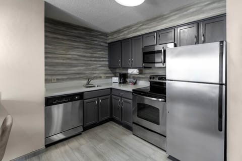 Studio, 1 King Bed with Sofa bed | Private kitchen | Full-size fridge, microwave, stovetop, dishwasher