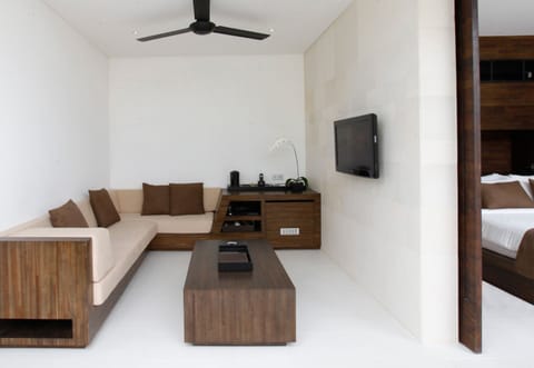 Pool Villa | Living room | 32-inch Smart TV with cable channels, TV, iPad