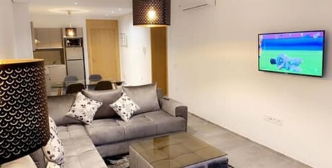 Apartment, 2 Bedrooms | Living room | Flat-screen TV