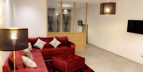 Apartment, 2 Bedrooms | Living room | Flat-screen TV