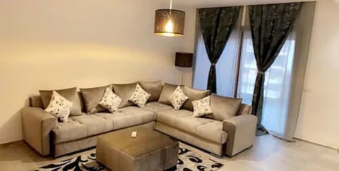 Apartment, 2 Bedrooms | Living room | Flat-screen TV