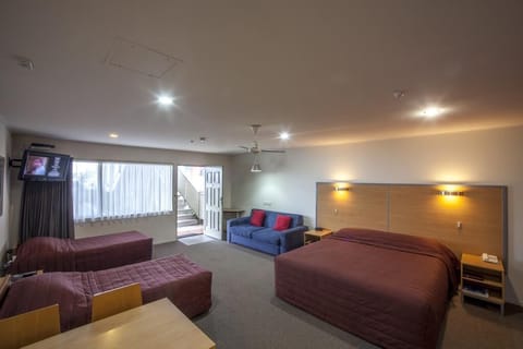 Large studio | Select Comfort beds, laptop workspace, blackout drapes, soundproofing