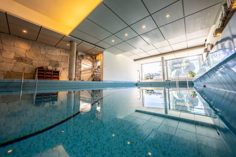 Indoor pool, sun loungers