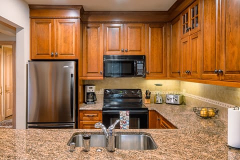 Standard Condo, 2 Bedrooms | Private kitchen | Full-size fridge, microwave, oven, stovetop