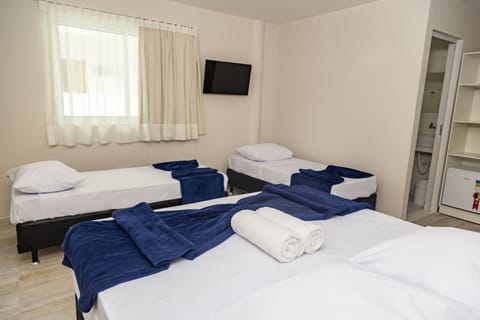 Comfort Quadruple Room | Minibar, free WiFi, bed sheets