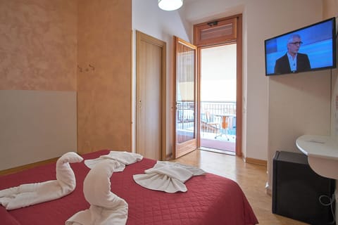 Premium bedding, blackout drapes, free WiFi, bed sheets