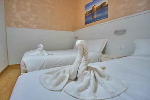 Comfort Room | Premium bedding, blackout drapes, free WiFi, bed sheets
