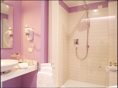 Shower, rainfall showerhead, designer toiletries, hair dryer