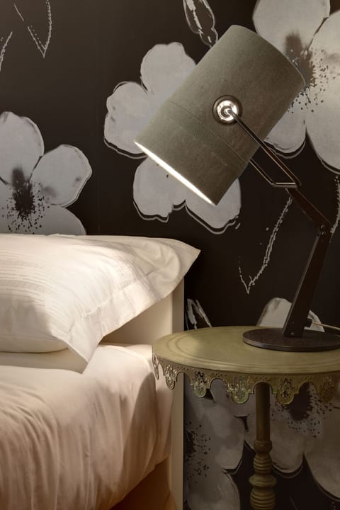 Premium bedding, down comforters, minibar, in-room safe