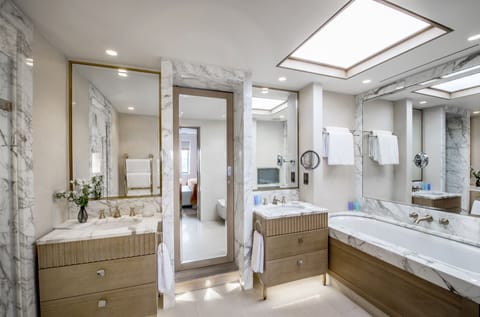 Suite, 1 King Bed, Terrace | Bathroom | Combined shower/tub, designer toiletries, hair dryer, bathrobes